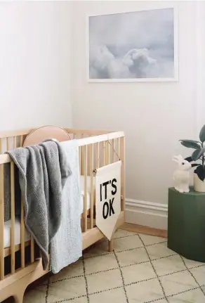  ??  ?? ABOVE & LEFT In Maggie’s room, Awakening from Sunday Home Store hangs above a Caravan crib by Kalon. The Rabbit nightlight from Nature Baby is super cute on the Arnold Circus stool by Martino Gamper, and the chair is from Copper & Pink. On the floor is...