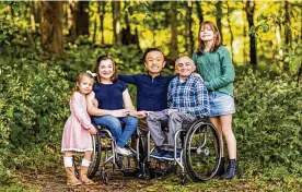  ?? CONTRIBUTE­D ?? University of Cincinanti professor Kara Ayers with her husband and three children. She is a co-founder of the Disabled Parenting Project.