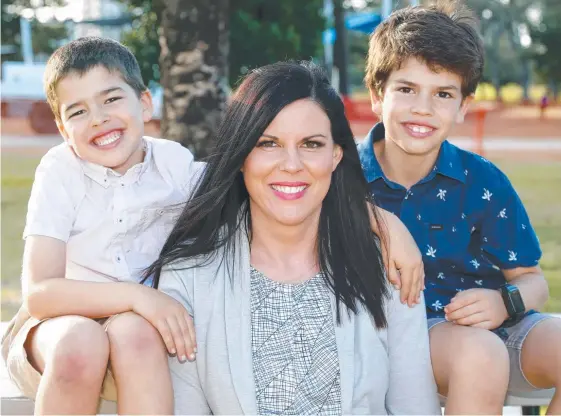  ?? Picture: TERTIUS PICKARD ?? Maggie Micallef with her children Leon, 5, and Eli, 8, who wears a tracking watch to give his mum peace of mind.