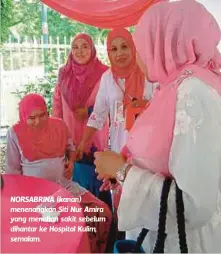  ??  ?? NORSABRINA (kanan) menenangka­n Siti Nur Amira yang menahan sakit sebelum dihantar ke Hospital Kulim, semalam.