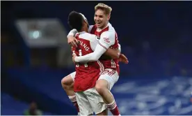  ?? Photograph: Shaun Botterill/ Reuters ?? Arsenal’s Emile Smith Rowe celebrates with Pierre-Emerick Aubameyang after taking advantage of a defensive blunder from Chelsea’s Jorginho.