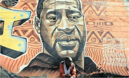  ??  ?? GRAFFITI in memory of the late American George Floyd, painted on a perimeter wall by a group of Kenyan graffiti artists in support of the Black Lives Matter movement in the Kibera slums in Nairobi. People across the globe have protested against the killing of Floyd by Minneapoli­s police. | EPA