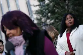  ?? Photograph: Bonnie Cash/Reuters ?? Freeman (in foreground) and Moss received voicemails filled with racial slurs and graphic death threats after Giuliani defamed them.