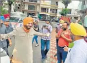  ?? ANI ?? Punjab Pradesh Congress Committee working president Kuljit Singh Nagra (R) welcomes newly appointed state unit president Navjot Singh Sidhu at his residence in Mohali on Monday.