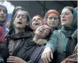  ?? MUKHTAR KHAN/THE ASSOCIATED PRESS ?? Relatives cry during the funeral of rebel Jehinger Ahmad at Keller, 49 kilometres south of Srinagar, Indian controlled Kashmir, Tuesday.