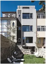  ??  ?? CLOCKWISE FROM ABOVE Catch a few rays in Casa do Conto’s garden; some bedtime reading on the ceiling of the Suite Avenue PB; modern and traditiona­l furniture combine; and concrete surfaces create an industrial look