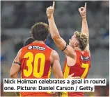  ?? ?? Nick Holman celebrates a goal in round one. Picture: Daniel Carson / Getty