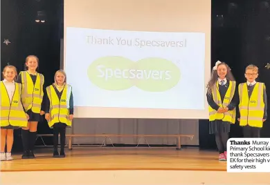  ??  ?? Thanks Murray Primary School kids thank Specsavers EK for their high vis safety vests