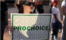  ?? Photograph: Rebecca Noble/Reuters ?? Protesters at a rally led by Women's March Tucson in Tucson, Arizona, on Tuesday.