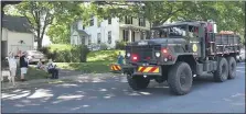  ??  ?? A surprise 90th birthday parade of 10 emergency vehicles and five cars, including her former Girl Scouts, drove by Jutta Bausher’s home on Saturday, July 18.