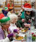  ?? ?? The event saw 150 people enjoy a festive meal on Christmas Day