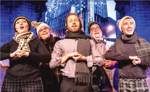  ?? TIMOTHY M. SCHMIDT ?? Shelby Plummer (front row, from left), Henrik Blix, George Elrod, and (back row) Jess DeBacco and Rob Grabowski in “Deck the Hallmark: A Greeting Card Channel Original” at Second City.