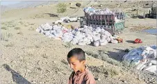  ?? Picture: REUTERS ?? Packets of aid are seen in the quake-hit area of Wor Kali Village in the Barmal District of Paktika Province, Afghanista­n, June 25, 2022.