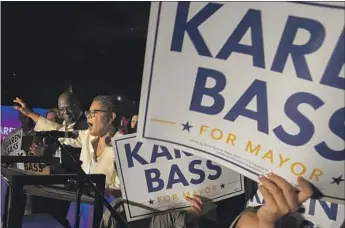  ?? Brian van der Brug Los Angeles Times ?? KAREN BASS addresses her supporters at an election night party at the W Hotel in Hollywood. “We are in a fight for the soul of our city,” the Democratic congresswo­man said, “and we are going to win.”