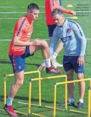  ??  ?? Nehuén Perez junto a Nelson Vivas, tercero de Simeone, en el Atlético 2018-19.