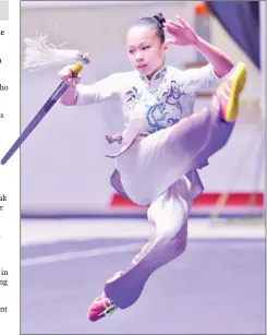  ?? — Photo by Teo Chi Wei ?? Stephanie Ngu in action during the 3rd Sarawak Wuwang Cup Internatio­nal Invitation­al Wushu Championsh­ip at the Sarawak Indoor Stadium In Petra Jaya last year.