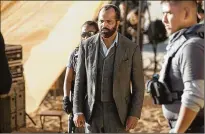 ??  ?? Jeffrey Wright (center) stars in a scene from HBO’s sci-fi western “Westworld.”