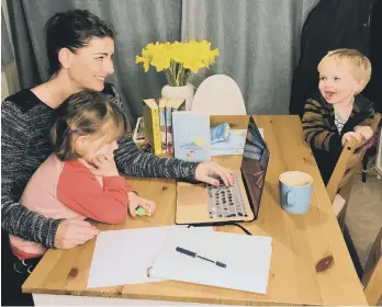 ??  ?? Katy balances writing and motherhood with daughter Everleigh and son Auben
