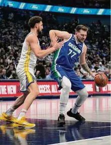  ?? Tony Gutierrez/Associated Press ?? Dallas guard Luka Doncic racked up 41 points, 12 assists and 12 rebounds in the Mavericks’ victory over Golden State.