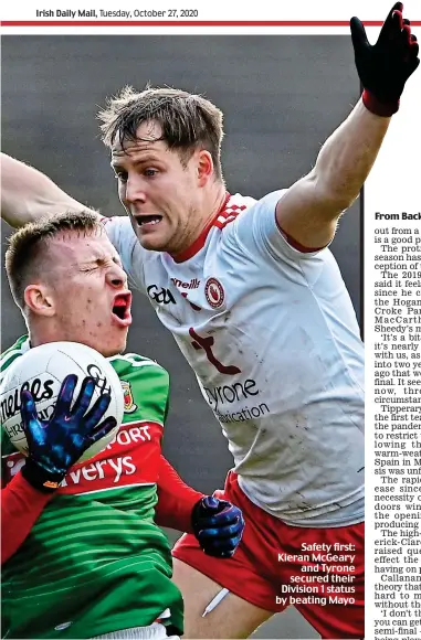  ??  ?? Safety first: Kieran McGeary and Tyrone secured their Division 1 status by beating Mayo