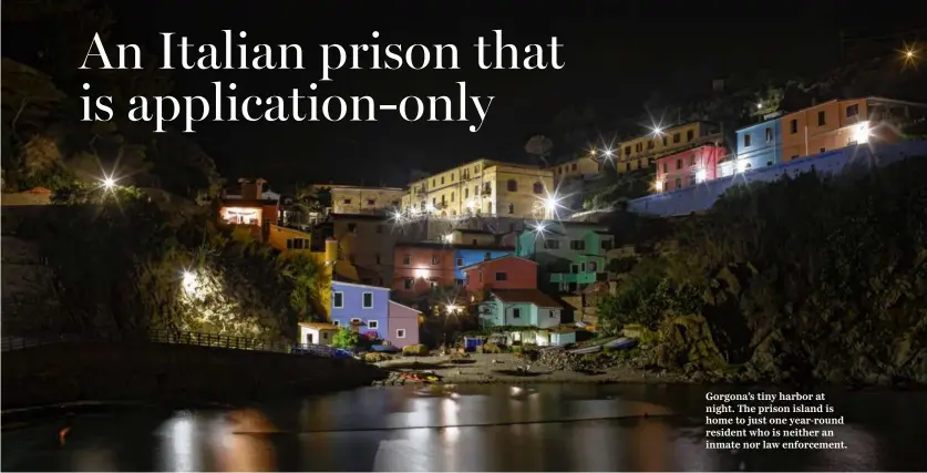  ?? ?? Gorgona’s tiny harbor at night. The prison island is home to just one year-round resident who is neither an inmate nor law enforcemen­t.