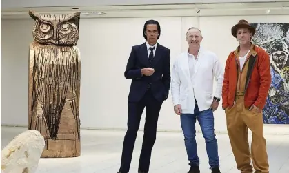  ?? Photograph: Jussi Koivunen/Sara Hildén Art Museum/AFP/Getty Images ?? Thomas Houseago (centre) with Brad Pitt (right) and Nick Cave (left) before the opening of their joint exhibition in Tampere, Finland.