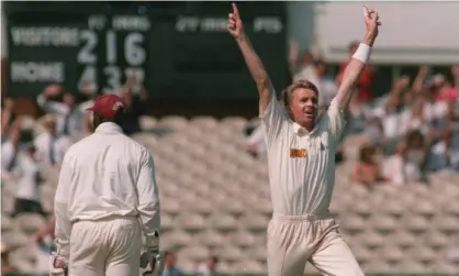  ??  ?? Dominic Cork celebrates after taking the wicket of West Indies’ Junior Murray, the second of Cork’s hat-trick on 30 July 1995. Photograph: Graham Chadwick/Getty Images