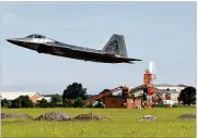  ?? JONATHON GRUENKE / THE DAILY PRESS ?? An F-22 departs Langley Air Force Base, Va., Tuesday as Hurricane Florence approaches the Eastern Seaboard.