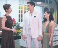  ?? SANJA BUCKO/THE THE ASSOCIATED PRESS ?? From left, Michelle Yeoh, Henry Golding and Constance Wu in Crazy Rich Asians, opening Aug. 15 in Toronto.