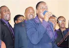  ??  ?? Members of the Jamaica Constabula­ry Force Choir at Deron Henry’s funeral on Saturday.