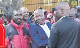  ?? Picture: Nigel Sibanda ?? ALL SMILES. EFF general secretary Godrich Gardee, left, leader Julius Malema, centre, and national chairperso­n Dali Mpofu.