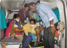  ?? Associated Press ?? A woman with an unknown illness arrives at a hospital in Andhra Pradesh state. Nearly 600 people have fallen ill.