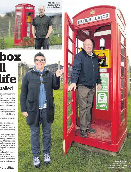  ??  ?? On call Mark Baillie with the new defibrilla­tor
Stepping out Gordon Thom and Kirsteen Mitchell show off the vital equipment