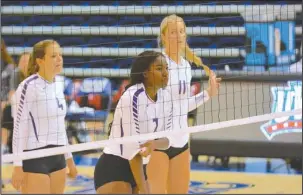  ?? Submitted photo ?? PERFECT START: Ouachita Baptist front line players, from left, Paige Williams, Adrianna Nolly and Emily Low prepare for a point last weekend during the Alabama-Huntsville Classic tournament. The Tigers were 4-0 in the opening weekend of the season.