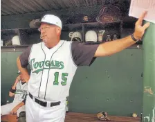  ?? Karl Gehring, Denver Post file ?? Bob Bote watches the Niwot Cougars practice before a playoff game against Arvada West in 2004.