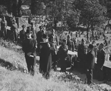  ??  ?? Curly’s funeral, Merthyr Tydfil, Wales. The ceremony included two Spitfires performing an honour flyby. One of the pilots was killed a week later in France.