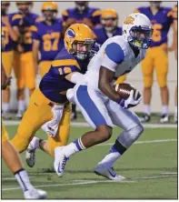  ?? (Arkansas Democrat-Gazette file photo) ?? Former North Little Rock wide receiver K.J. Hill (right) looks for running room as Little Rock Catholic’s Harper Vondran closes in during a 2014 game. Hill caught 58 passes for 1,023 yards and 11 touchdowns, and rushed for 386 yards and 7 touchdowns that year for the Charging Wildcats.