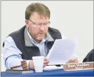  ?? Westside Eagle Observer/SUSAN HOLLAND ?? Gravette’s mayor, Kurt Maddox, reads his annual State of the City address to members of the Gravette city council at their regular meeting Thursday evening, Jan. 14.