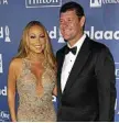  ??  ?? EXPENSIVE BREAK: Mariah Carey and James Packer.