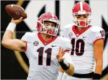  ?? CURTIS COMPTON / CCOMPTON@AJC.COM ?? Quarterbac­k Jake Fromm (11) has led the Dogs to a 6-0 start and a No. 4 ranking after he stepped in when Jacob Eason (10) was injured in the first game.