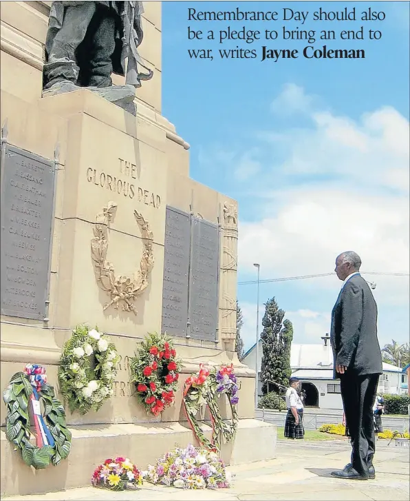  ?? Picture: FILE ?? IN MEMORY: A former ANC liberation fighter pays homage to fallen comrades after laying a wreath at the East London War Memorial on Remembranc­e Day