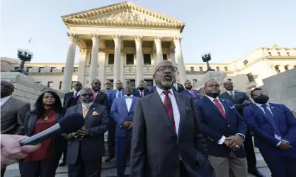  ?? Rogelio V Solis/AP ?? Mississipp­i state representa­tive Robert Johnson and other Democrats in Jackson earlier in March to object to Senate Bill 2113. Photograph: