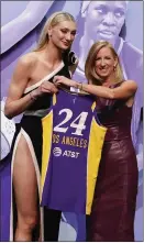  ?? ADAM HUNGER — THE ASSOCIATED PRESS ?? Stanford’s Cameron Brink, left, poses with WNBA commission­er Cathy Engelbert after being taken second by the Sparks.