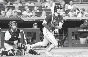  ?? AP ?? The Rays’ Josh Lowe watches his three-run double against the Yankees in the sixth inning on Thursday.