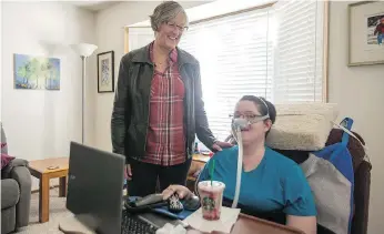  ?? LIAM RICHARDS ?? Erin Millikin, who has muscular dystrophy, is using Individual­ized Funding to hire and manage her own care staff. Her mother, Marilyn, left, helps her with the bookkeepin­g and paperwork.
