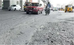  ??  ?? The main roads are damaged and there are no internal roads because of which movement of traffic gets badly affected. — DC