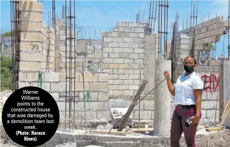  ?? (Photo: Horace Hines) ?? Warner Williams points to the constructe­d house that was damaged by a demolition team last week.