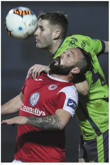  ??  ?? Kevin Farragher of Drogheda United gets above Raffaele Cretaro of Sligo Rovers.