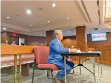  ?? AP PHOTO/JEFF AMY ?? Georgia Gov. Brian Kemp speaks to a state House committee in Atlanta on earlier this month. Kemp has said he will ask lawmakers to consider new laws to combat crime in Atlanta during a special legislativ­e session this fall.