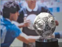  ?? ?? The match ball used in the 1986 FIFA World Cup Quarter-Final football match between Argentina and England, played at the Estadio Azteca, Mexico City, is pictured during a photocall ahead of its auction, at Wembley Stadium in London on November 1, 2022.